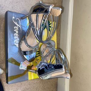 Women’s/ kids silver heels size 5 women’s/ 3 kids